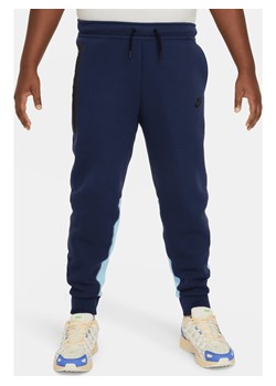 Spodnie dla dużych dzieci (chłopców) Nike Sportswear Tech Fleece (szersze rozmiary) - Niebieski ze sklepu Nike poland w kategorii Spodnie chłopięce - zdjęcie 169754927