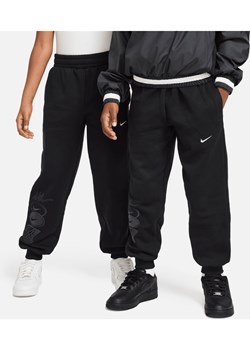 Spodnie z dzianiny dla dużych dzieci Nike Culture of Basketball - Czerń ze sklepu Nike poland w kategorii Spodnie chłopięce - zdjęcie 169755657