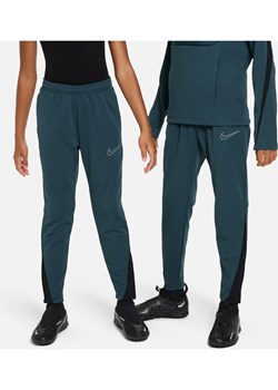 Spodnie piłkarskie dla dużych dzieci Nike Therma-FIT Academy - Zieleń ze sklepu Nike poland w kategorii Spodnie męskie - zdjęcie 169756245