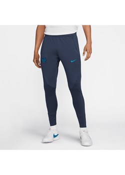 Męskie spodnie piłkarskie z dzianiny Nike Dri-FITFC Barcelona Strike (wersja trzecia) - Niebieski ze sklepu Nike poland w kategorii Spodnie męskie - zdjęcie 169756417