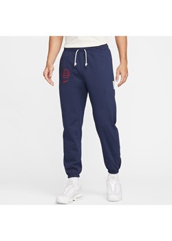 Męskie spodnie piłkarskie Nike Paris Saint-Germain Standard Issue - Niebieski ze sklepu Nike poland w kategorii Spodnie męskie - zdjęcie 169756715