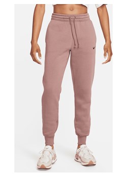 Damskie spodnie dresowe ze średnim stanem Nike Sportswear Phoenix Fleece - Fiolet ze sklepu Nike poland w kategorii Spodnie damskie - zdjęcie 169757069