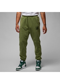 Męskie spodnie zimowe z dzianiny Jordan Essentials - Zieleń ze sklepu Nike poland w kategorii Spodnie męskie - zdjęcie 169757165