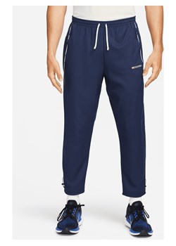 Męskie spodnie do biegania Dri-FIT Nike Challenger Track Club - Niebieski ze sklepu Nike poland w kategorii Spodnie męskie - zdjęcie 169757315