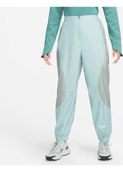 Damskie spodnie do biegów przełajowych Nike Trail Repel - Zieleń ze sklepu Nike poland w kategorii Spodnie damskie - zdjęcie 169757345