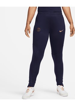 Damskie dzianinowe spodnie piłkarskie Nike Dri-FIT Paris Saint-Germain Strike - Niebieski ze sklepu Nike poland w kategorii Spodnie damskie - zdjęcie 169757446