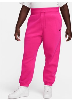Damskie spodnie dresowe o kroju oversize z wysokim stanem Nike Sportswear Phoenix Fleece (duże rozmiary) - Różowy ze sklepu Nike poland w kategorii Spodnie damskie - zdjęcie 169758237