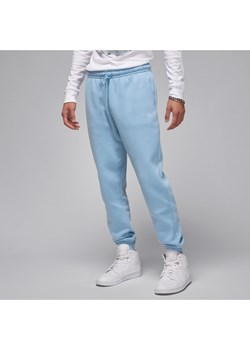 Męskie spodnie dresowe Jordan Brooklyn Fleece - Niebieski ze sklepu Nike poland w kategorii Spodnie męskie - zdjęcie 169758805