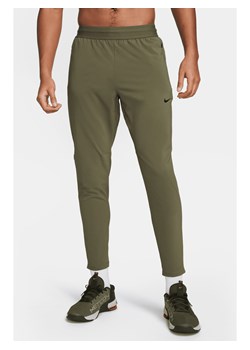 Męskie spodnie do fitnessu Dri-FIT Nike Flex Rep - Zieleń ze sklepu Nike poland w kategorii Spodnie męskie - zdjęcie 169758836