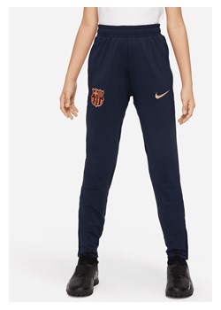 Spodnie piłkarskie dla dużych dzieci FC Barcelona Strike Nike Dri-FIT - Niebieski ze sklepu Nike poland w kategorii Spodnie chłopięce - zdjęcie 169758886