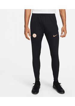 Męskie spodnie piłkarskie z dzianiny Nike Dri-FIT ADV Chelsea F.C. Strike Elite - Niebieski ze sklepu Nike poland w kategorii Spodnie męskie - zdjęcie 169759138