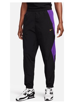 Męskie spodnie piłkarskie Therma-FIT Repel Nike Culture of Football - Czerń ze sklepu Nike poland w kategorii Spodnie męskie - zdjęcie 169759289