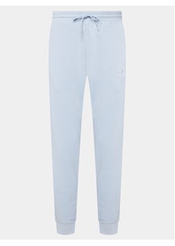 Converse Spodnie dresowe Unisex Core 10023873-A26 Niebieski Regular Fit ze sklepu MODIVO w kategorii Spodnie męskie - zdjęcie 169774796