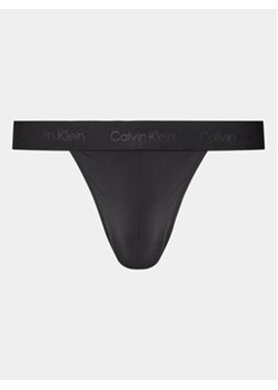 Calvin Klein Underwear Stringi 000NB3854A Czarny ze sklepu MODIVO w kategorii Majtki męskie - zdjęcie 169777918