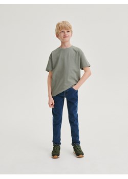 Reserved - Elastyczne jeansy slim - granatowy ze sklepu Reserved w kategorii Spodnie chłopięce - zdjęcie 169779567