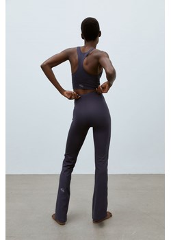 H & M - Rozszerzane spodnie sportowe DryMove - Niebieski ze sklepu H&M w kategorii Spodnie damskie - zdjęcie 169801035