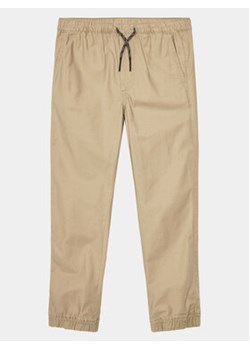 Gap Spodnie materiałowe 707988-03 Beżowy Regular Fit ze sklepu MODIVO w kategorii Spodnie chłopięce - zdjęcie 169812346