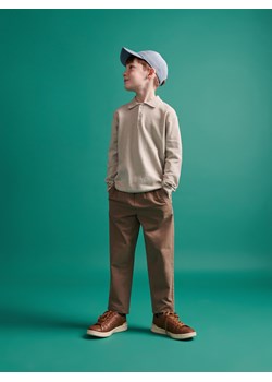 Reserved - Spodnie chino z efektem sprania - jasnofioletowy ze sklepu Reserved w kategorii Spodnie chłopięce - zdjęcie 169814039