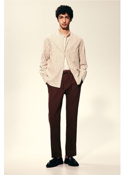 H & M - Spodnie z domieszką lnu Regular Fit - Beżowy ze sklepu H&M w kategorii Spodnie męskie - zdjęcie 169819169