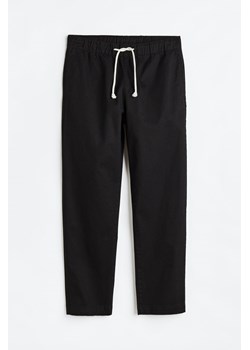 H & M - Bawełniane spodnie bez zapięcia Regular Fit - Czarny ze sklepu H&M w kategorii Spodnie męskie - zdjęcie 169819196