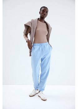 H & M - Spodnie dresowe z domieszką bawełny - Niebieski ze sklepu H&M w kategorii Spodnie damskie - zdjęcie 169834289
