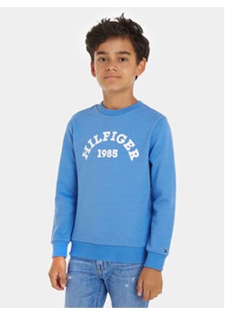 Tommy Hilfiger Bluza 1985 KB0KB09000 Niebieski Regular Fit ze sklepu MODIVO w kategorii Bluzy chłopięce - zdjęcie 169842566