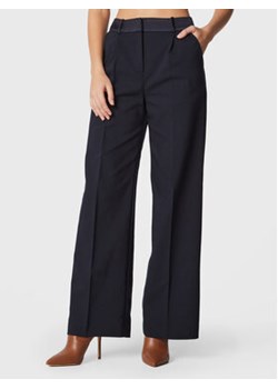 NAF NAF Spodnie materiałowe Everly THNP40 Granatowy Regular Fit ze sklepu MODIVO w kategorii Spodnie damskie - zdjęcie 169842678