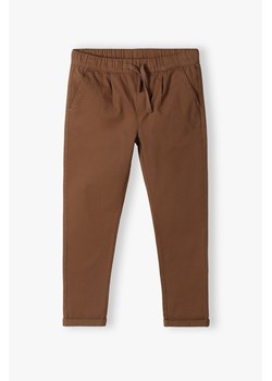 Brązowe spodnie dla chłopca - regular ze sklepu 5.10.15 w kategorii Spodnie chłopięce - zdjęcie 169880396