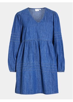 Vila Sukienka jeansowa Rowie 14091978 Niebieski Relaxed Fit ze sklepu MODIVO w kategorii Sukienki - zdjęcie 169895956