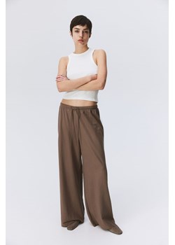H & M - Szerokie spodnie bez zapięcia - Beżowy ze sklepu H&M w kategorii Spodnie damskie - zdjęcie 169909119