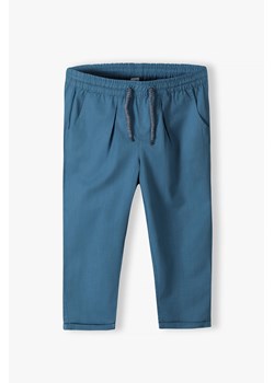 Niebieskie klasyczne długie spodnie dla chłopca regular ze sklepu 5.10.15 w kategorii Spodnie chłopięce - zdjęcie 169960467