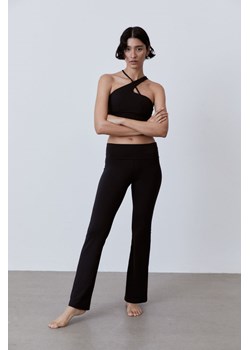 H & M - Legginsy sportowe SoftMove z odwijaną talią - Czarny ze sklepu H&M w kategorii Spodnie damskie - zdjęcie 169992235
