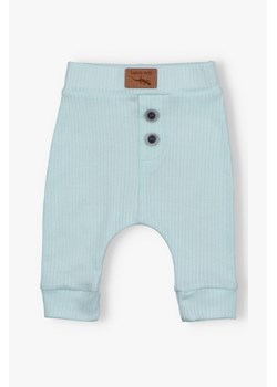 Różowe spodnie niemowlęce z dzianiny prążkowej -  Lagarto Verde ze sklepu 5.10.15 w kategorii Spodnie i półśpiochy - zdjęcie 169994599