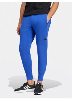 adidas Spodnie dresowe Z.N.E. Premium IR5206 Niebieski Regular Fit ze sklepu MODIVO w kategorii Spodnie męskie - zdjęcie 170022835