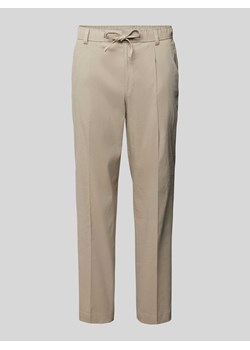 Spodnie o kroju regular fit z mieszanki lnu z zakładkami w pasie model ‘Perin’ ze sklepu Peek&Cloppenburg  w kategorii Spodnie męskie - zdjęcie 170038075