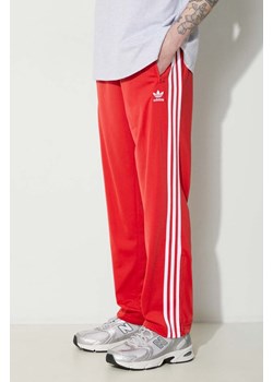 adidas Originals spodnie dresowe kolor czerwony wzorzyste IJ7057 ze sklepu PRM w kategorii Spodnie męskie - zdjęcie 170039208
