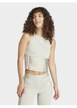 adidas Koszulka techniczna Hyperglam Shine Training IN6823 Beżowy Slim Fit ze sklepu MODIVO w kategorii Bluzki damskie - zdjęcie 170045376