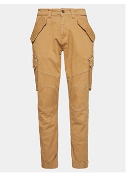 Alpha Industries Spodnie materiałowe Combat 126215 Zielony Slim Fit ze sklepu MODIVO w kategorii Spodnie męskie - zdjęcie 170073628