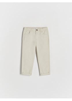 Reserved - Tkaninowe spodnie chino - beżowy ze sklepu Reserved w kategorii Spodnie i półśpiochy - zdjęcie 170125298