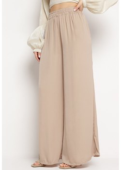 Beżowe Szerokie Spodnie z Wiskozy z Kieszeniami Rowalle ze sklepu Born2be Odzież w kategorii Spodnie damskie - zdjęcie 170139765