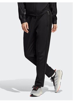 adidas Spodnie dresowe Tiro Suit-Up Advanced Tracksuit Bottoms IB2306 Czarny Regular Fit ze sklepu MODIVO w kategorii Spodnie damskie - zdjęcie 170149005