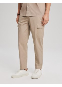 Spodnie JUST Beż 31 ze sklepu Diverse w kategorii Spodnie męskie - zdjęcie 170149429