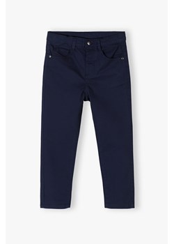 Granatowe eleganckie spodnie dla chłopca - slim - Max&Mia ze sklepu 5.10.15 w kategorii Spodnie chłopięce - zdjęcie 170154469
