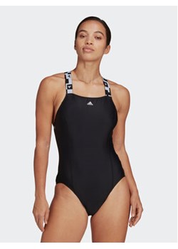 adidas Strój kąpielowy Tape Swimsuit HA6020 Czarny Fitted Fit ze sklepu MODIVO w kategorii Stroje kąpielowe - zdjęcie 170212105