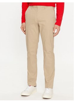 Tommy Hilfiger Chinosy Denton MW0MW24872 Beżowy Slim Fit ze sklepu MODIVO w kategorii Spodnie męskie - zdjęcie 170238376