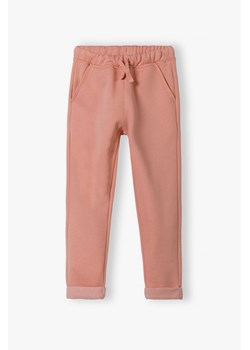 Spodnie dzianinowe dla dziewczynki z delikatnym ociepleniem w  środku i kieszeniami ze sklepu 5.10.15 w kategorii Spodnie dziewczęce - zdjęcie 170247558