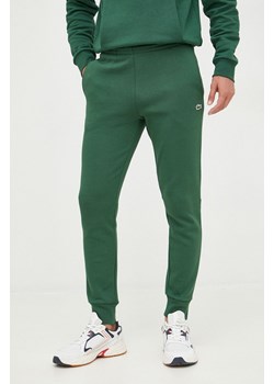 Lacoste spodnie dresowe męskie kolor zielony gładkie XH9624-132 ze sklepu PRM w kategorii Spodnie męskie - zdjęcie 170263717