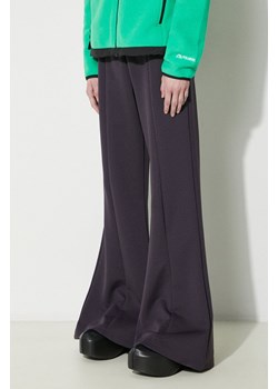 adidas Originals spodnie dresowe Premium Essentials Flared kolor fioletowy gładkie IS2673 ze sklepu PRM w kategorii Spodnie damskie - zdjęcie 170264215