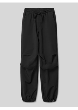 Spodnie o luźnym kroju z elastycznym pasem ze sklepu Peek&Cloppenburg  w kategorii Spodnie dziewczęce - zdjęcie 170272679