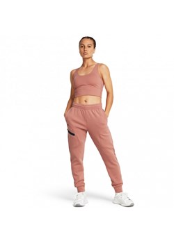 Damskie spodnie treningowe Under Armour Unstoppable Flc Jogger - różowe ze sklepu Sportstylestory.com w kategorii Spodnie damskie - zdjęcie 170278996